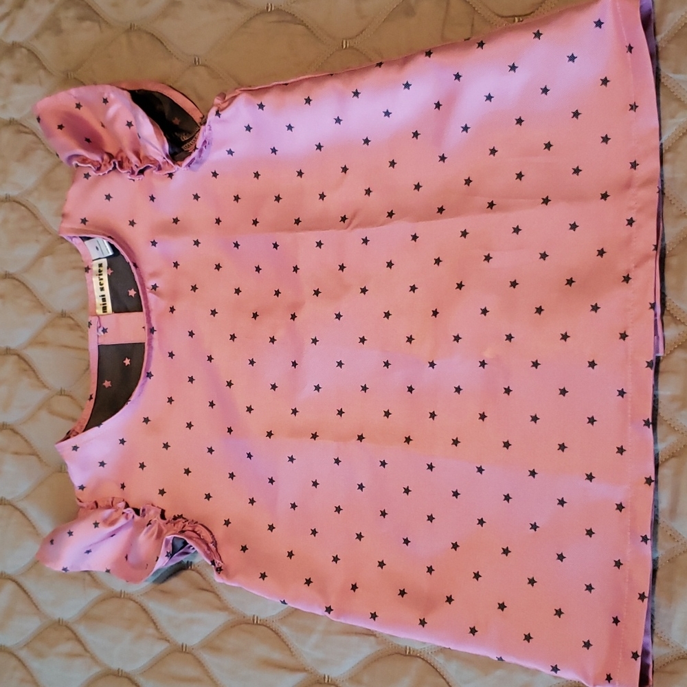 NWOT Stars button-down on the back top